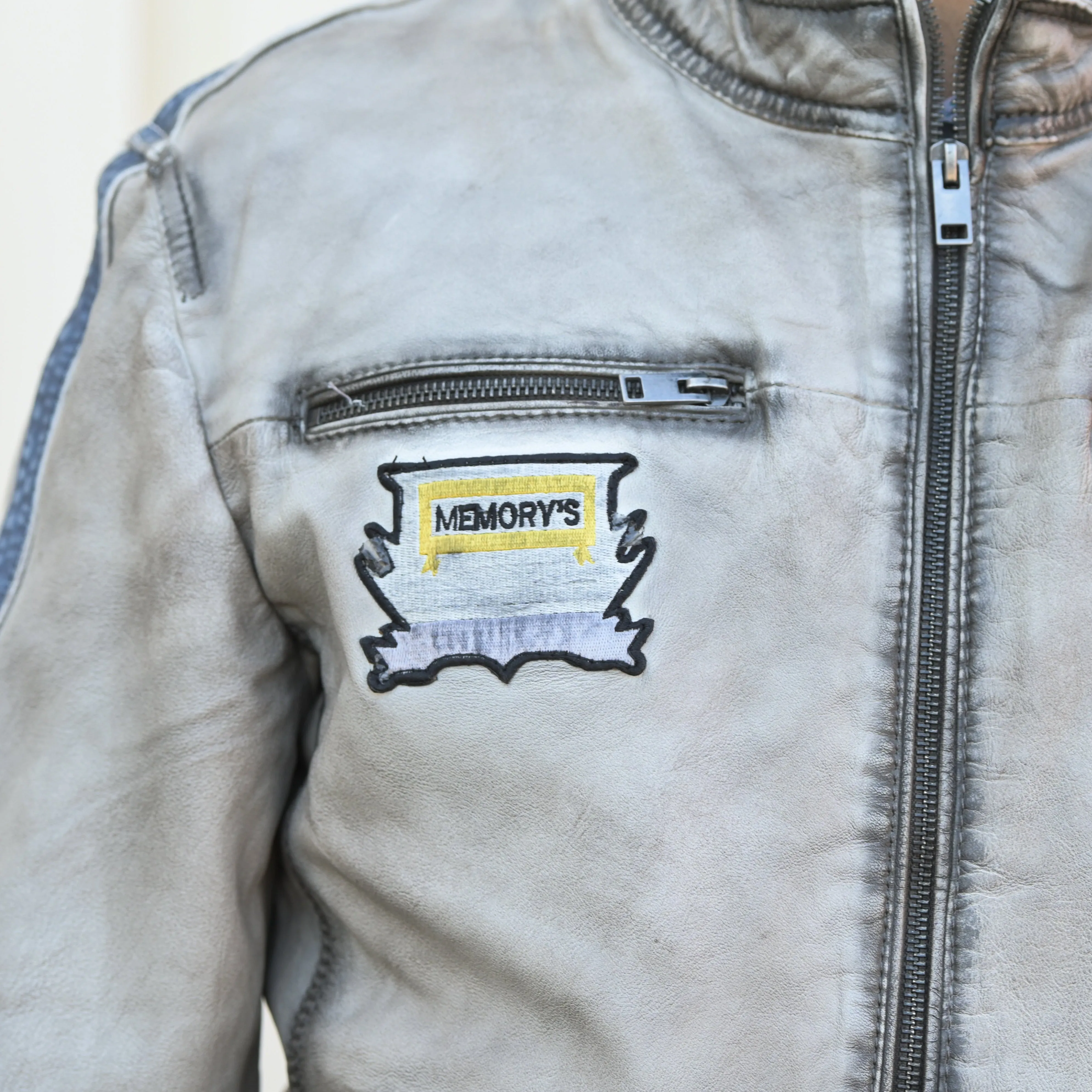 Men's Leather Jacket with Patches and Four Zip Pockets